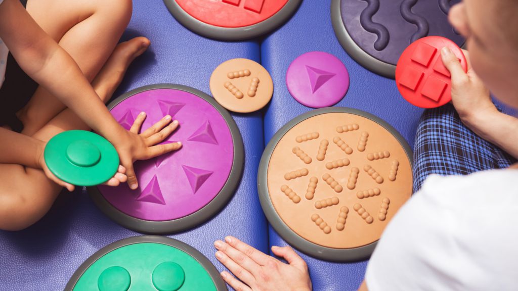 Children creating art during therapy session
