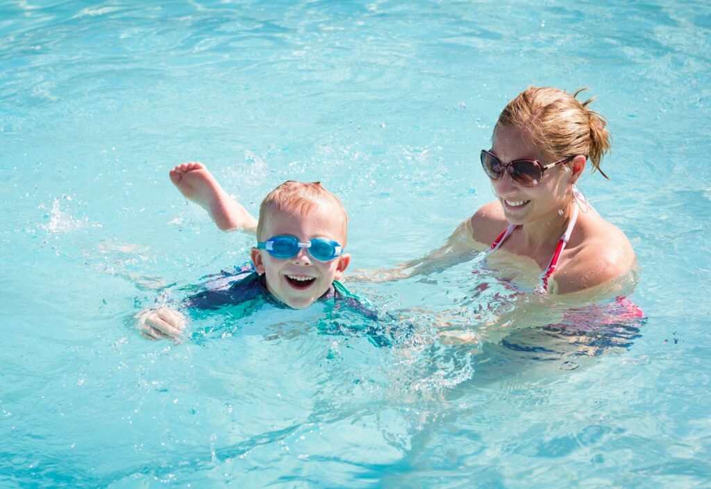 Child enjoying swimming therapy